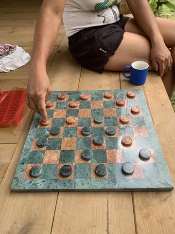 Marble checkerboard on the deck — a gift from Yolande