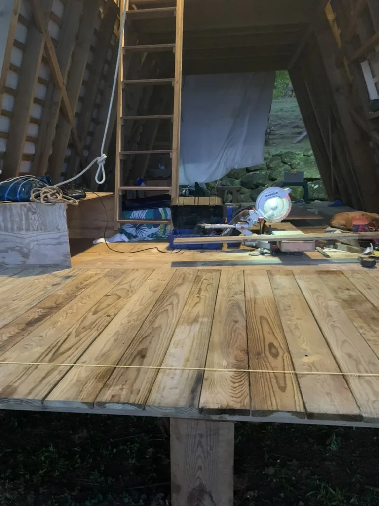 Finished deck, tools still out in front of the cabin